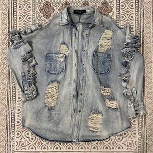 Distressed denim oversized button up